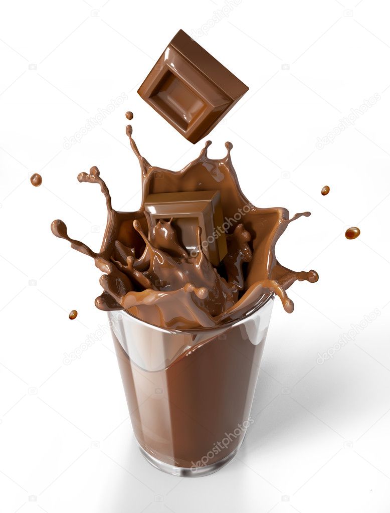 Chocolate cubes splashing into a chocolate milkshake glass.