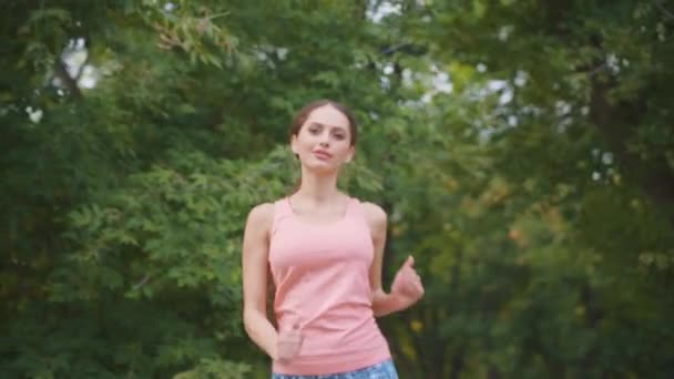 Athletic woman run running track in park summer day Caucasian female jogging dressed sportswear Medium shoot — Stock Video