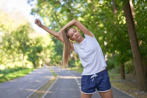 Woman Runner Stretching Arms Exercising Summer Park Morning Middle Age — Stock Photo, Image