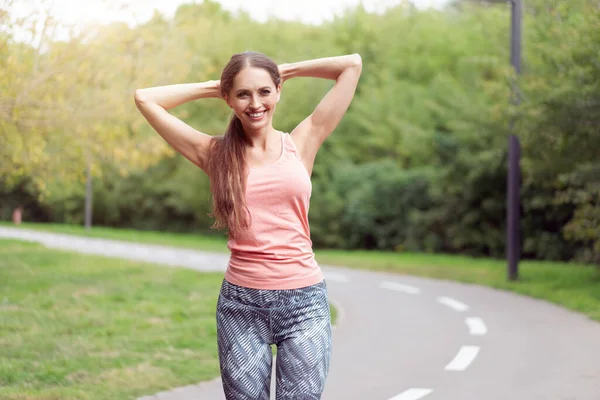 Woman Runner Stretching Arms Running Summer Park Middle Age Athletic — Stock Photo, Image