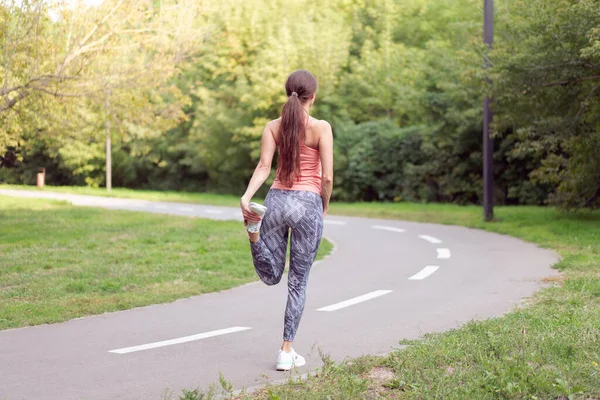 Athletic Woman Warming Legs Running Exercises Standing Running Track Summer — Stock Photo, Image