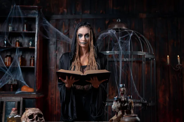 Halloween Concept Witch Dressed Black Hood Dreadlocks Standing Dark Dungeon — Stock Fotó
