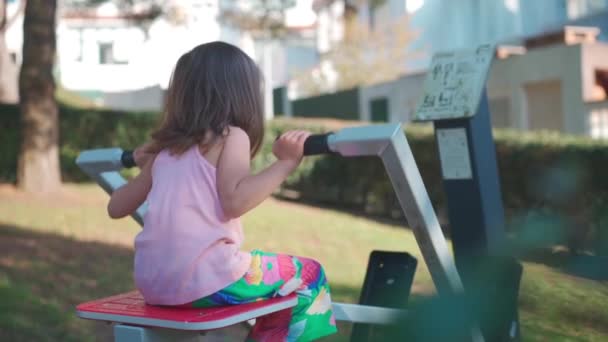 Active Little Girl Child Trains Simulator City Park She Pulls — Vídeo de stock
