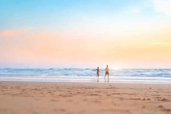 Couple Running Beach Happy Couple Swim Ocean Sunset Blurred Summer — Stockfoto