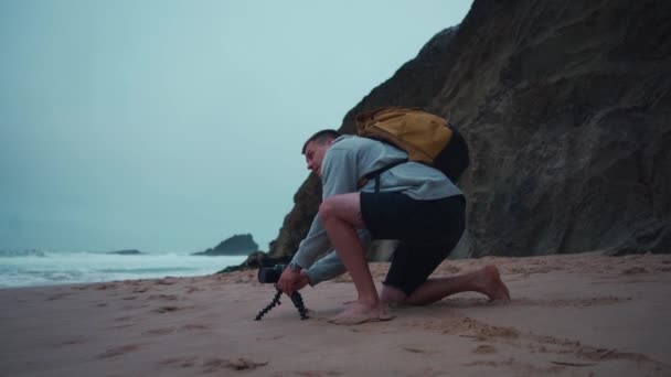 Hipster Traveler Photographer Takes Photo Tripod Beautiful Atlantic Ocean Landscape — Video Stock