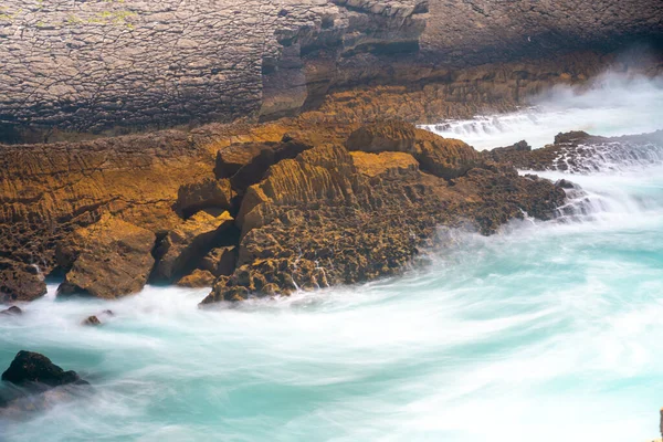 Atlantic ocean. Stormy summer day Big sea wave on rocky beach. Beaty in nature. Dramatic sea view. Long exposure