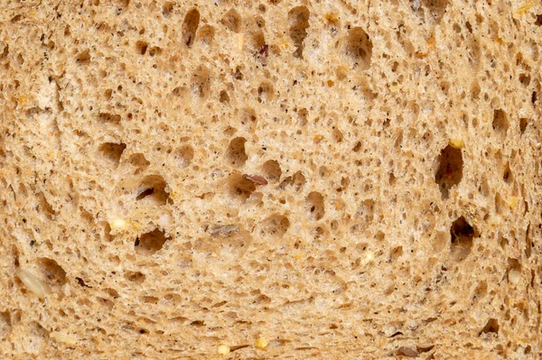 La consistenza del pane con i semi per una dieta sana — Foto Stock
