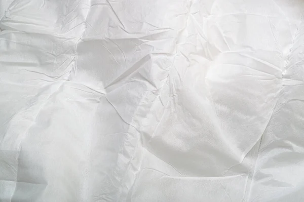 Текстура смятой синтетической ткани с сеткой — стоковое фото