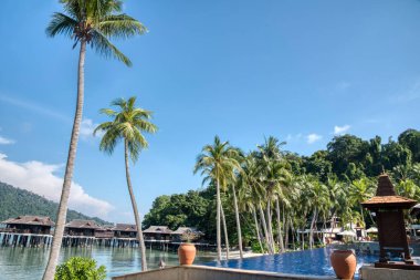 Perak, Malaysia.January 10,2022: Scene of outdoor lap swimming pool around the Royal Bay Beach club at Pangkor Laut Resort,Lumut.