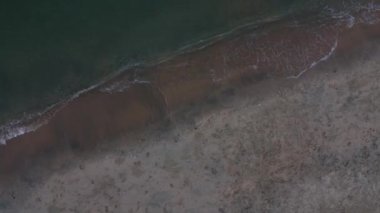 looking down from sky down below the shoreline.