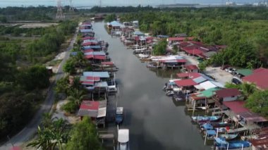 aerial scene around the village fishing harbor river
