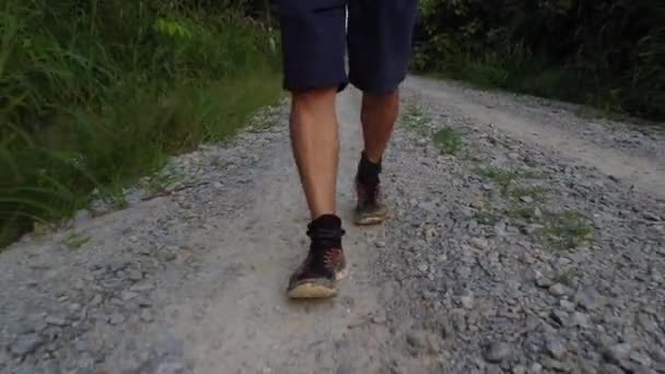 Walking Alone Rough Gravel Rural Road — Vídeo de Stock