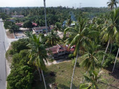 the environment around the simple rural malay town,
