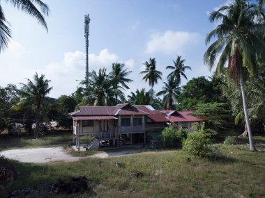 the environment around the simple rural malay town,