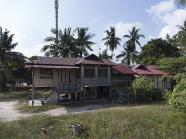 the environment around the simple rural malay town,