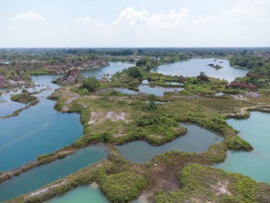 granite hill looking down to the abandoned mine ponds.
