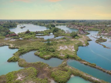granite hill looking down to the abandoned mine ponds.