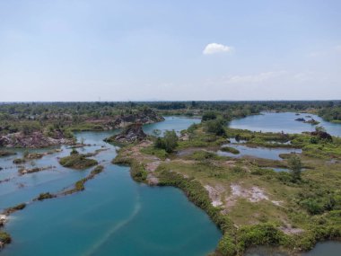 granite hill looking down to the abandoned mine ponds.