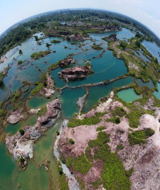 granite hill looking down to the abandoned mine ponds.