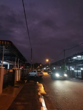 street scene at night after the rain