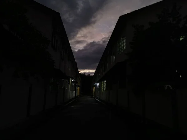 street scene at night after the rain