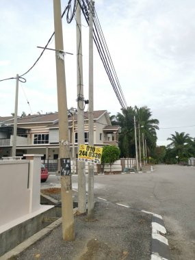 Perak,Malaysia.August 15,2022: Scene of loan placard advertisement along the roadside at Mas 1 residential Kg Koh street.