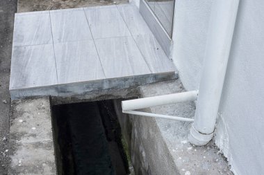 outdoor concrete drainage system at the residence houses.