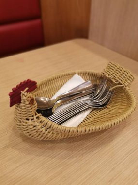 basket made from rattan for utensil holder.