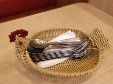 basket made from rattan for utensil holder.