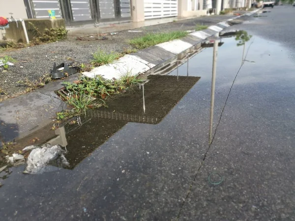 Reflective Puddle Stagnant Water Roadside Rain — Stock Photo, Image