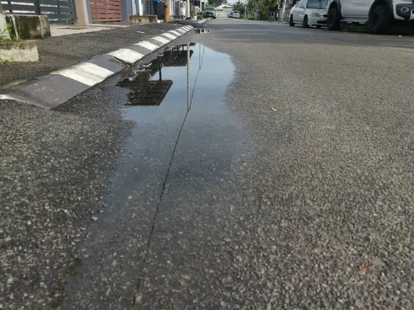 Reflective Puddle Stagnant Water Roadside Rain — Stock Photo, Image