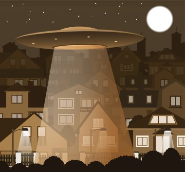 gece kent üzerinde uçan ufo