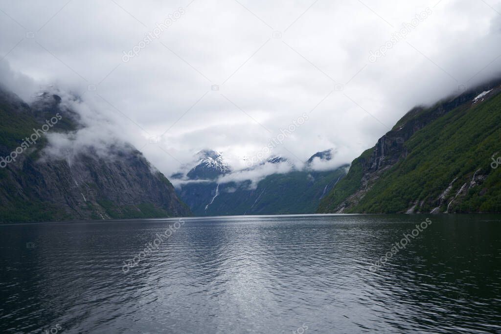 GEIRANGER, NORWAY - 2020 JUNE 21. The famous Seven Sisters waterfall in the Geiranger Fjord.