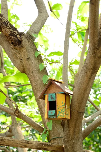 Birdhouse in the autumn forest — Stock Photo, Image