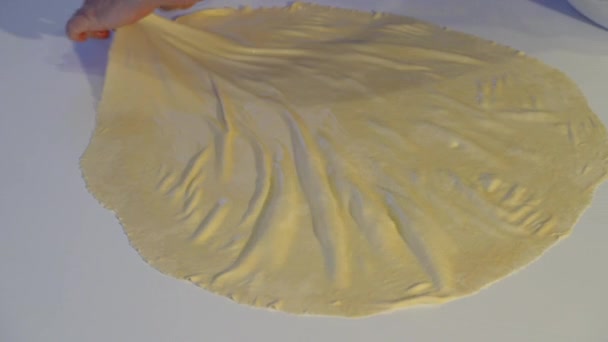 Stretching Geolied Phyllo Tafel — Stockvideo