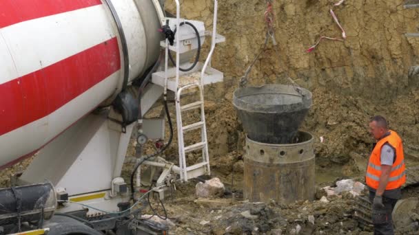 Construction Works Bringing Concrete Pile Mixer — Stok video