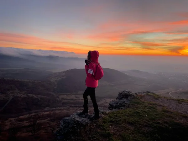 Woman Hiker Standing Top Hill Admiring Sunset Winter 图库图片