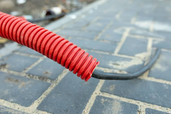 Red Plastic Corrugated Pipe Wires Bringing Electricity Construction Site Close — Stock Photo, Image