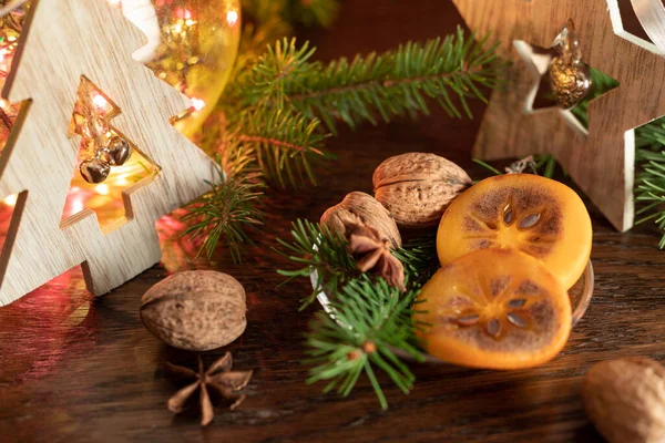 Christmas Still Life Slices Fresh Persimmon Wooden Star Fir Fir — Stock Photo, Image