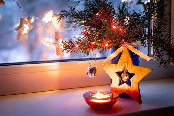 New Year Christmas Window Decoration Wooden Star Candlestick Spruce Branches Stock Image