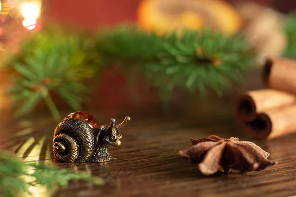 Christmas New Year Composition Souvenir Figure Snail Next Fir Tree — Stock Photo, Image