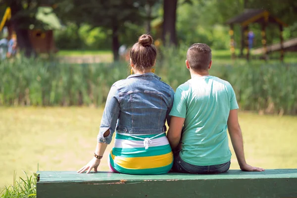 Loving couple on a bench — Stock Photo, Image