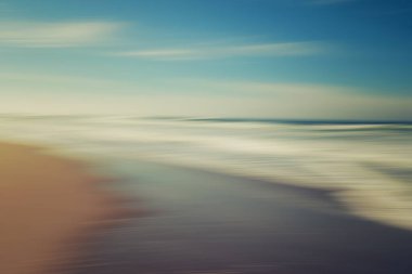 Sunset over the sea in light blue  turquoise and yellow colors, abstract seascape background, line art, soft blur, water surface
