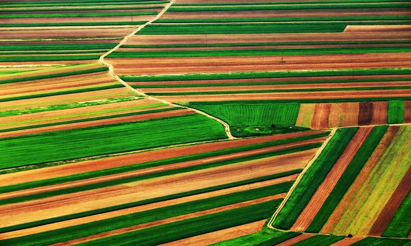 Vista aérea abstracta de un paisaje agrícola del país — Foto de Stock