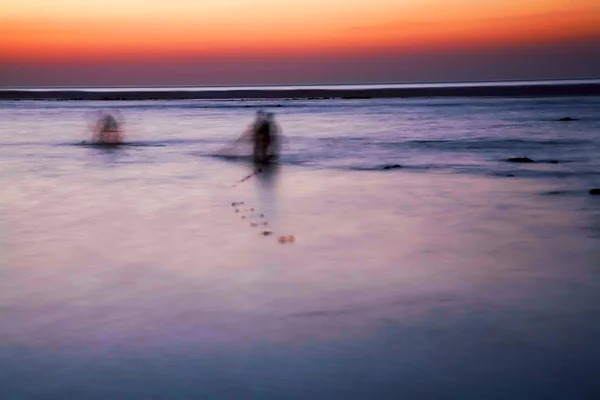 Fishermen in the Atlantic Ocean, Morocco, Africa - abstract image — Stock Photo, Image