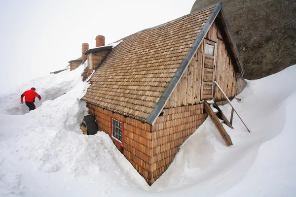 Alpské útočiště sněhem — Stock fotografie