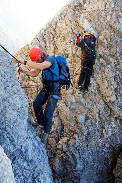 Climbing alpinists on Koenigsjodler route, Austria Royalty Free Stock Images