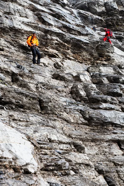 Alpinists climbing Eiger Peak — Stock Photo, Image