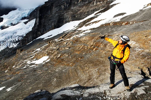 Alpinist contemplating the Eiger Glacier, Switzerland Royalty Free Stock Photos