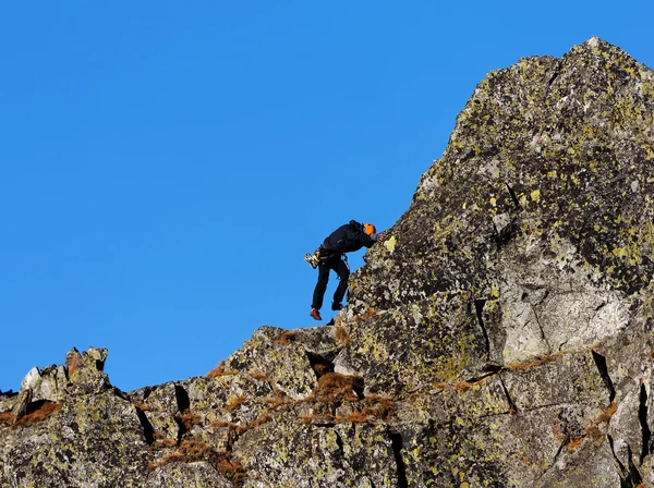 Climbing alpinist — Stock Photo, Image